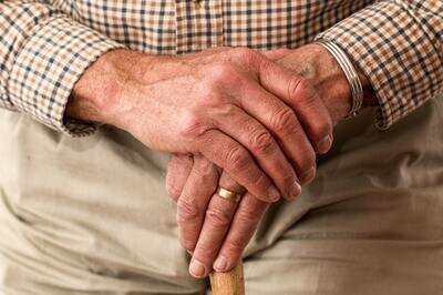 HRMS benefits for retirees - old man with stick