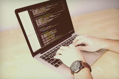 open source HRMS - laptop with code