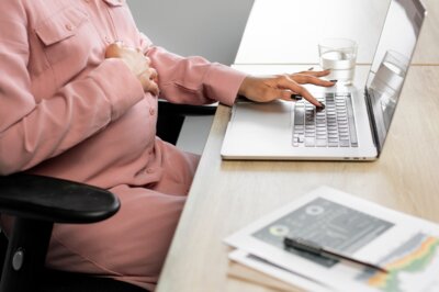 recruitment compliance checklist - man writing in notebook